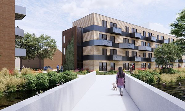 Een wandelende vrouw op een brug op de Carmenlaan 