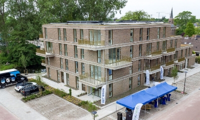 Appartementencomplex aan de Taxuslaan met 2 Gorter dakluiken met schaartrappen