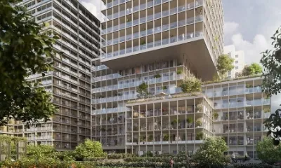 Afbeelding van een appartementencomplex bij de Bijlmerbajes voorzien van een Gorter dakluik met schaartrap