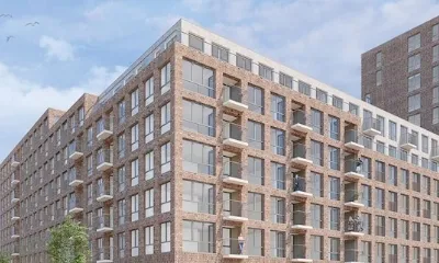 Een appartementencomplex met een Gorter dakluik 